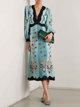 Einzigartiges langärmliges Midikleid mit Blumenmuster und Kontrast